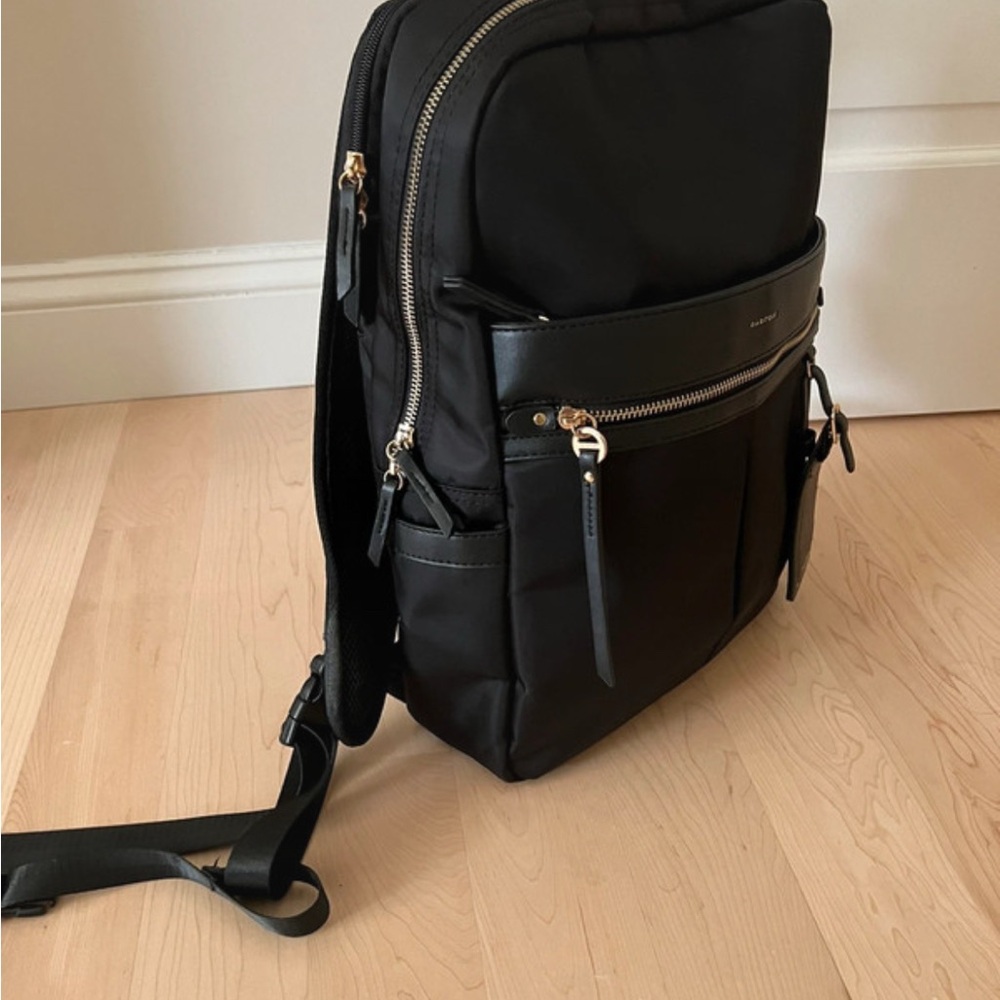 Elegant Black Backpack with Gold Accents